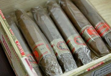 Do you remove the plastic wrapper when storing in your cigar humidor?