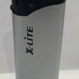 Cigar Star's X Lite cigar lighter with refillable fuel window on the bottom