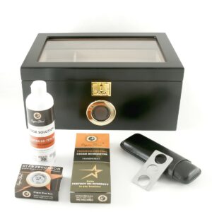 Complete cigar humidor gift set including cigar cutter, case, and humidifier solution