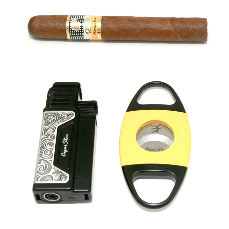 5. Cigar Star gift set featuring a triple-torch lighter, precision cigar cutter, and punch tool in a sophisticated gift box.